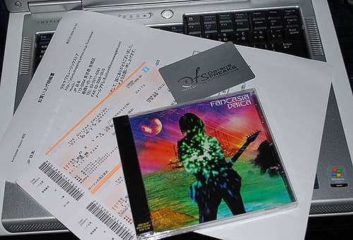 Ticket, CD, and membership card.